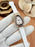 Women's Movement: Quartz, Water Resistant Watch.